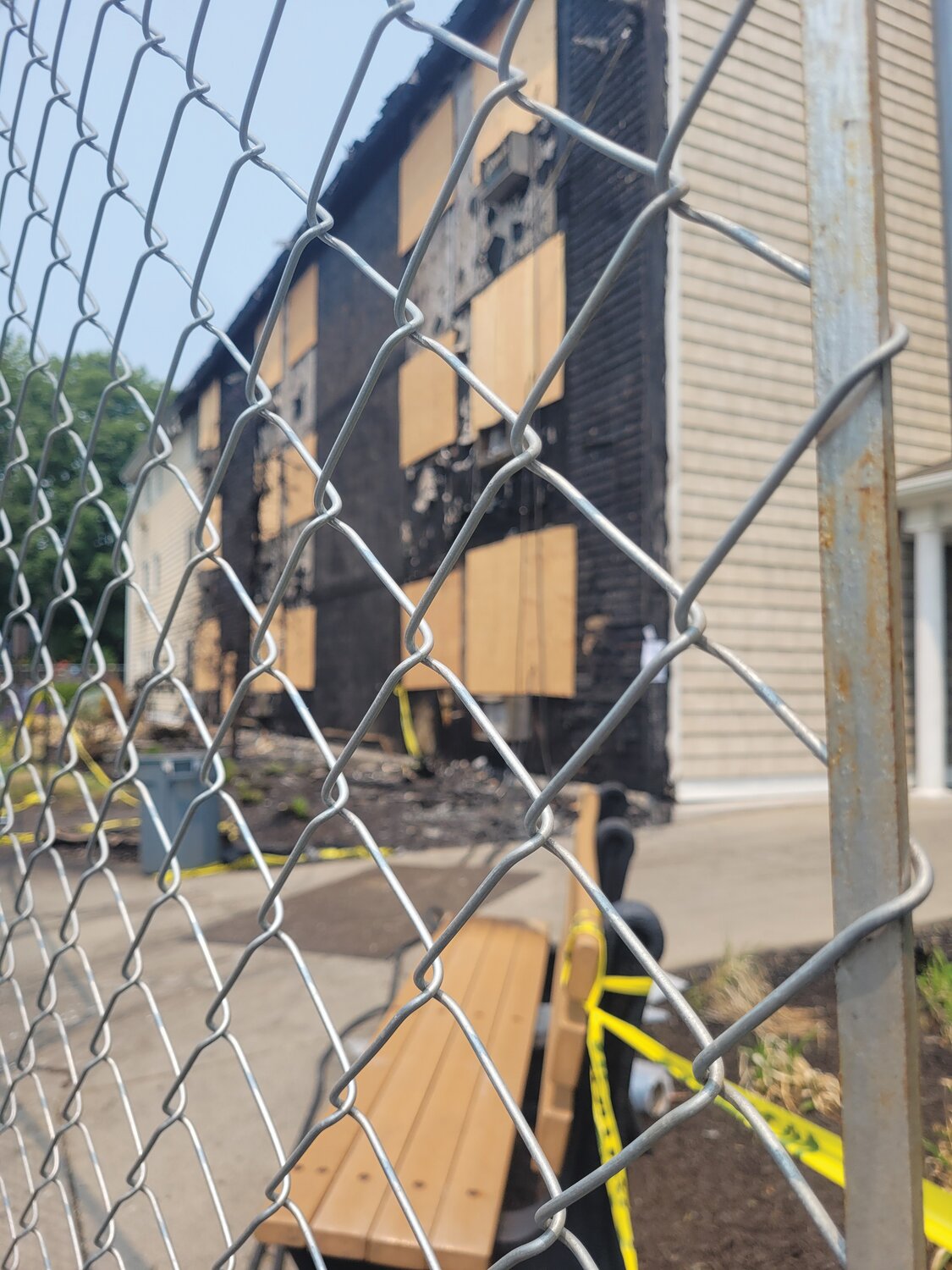 BURNED OUT: The building property manager says it may be as long as 6 to 12 months until Simmons Village apartment tenants are allowed to return to their homes. She said that the 45-unit building, constructed in 1979, has to be completely gutted as a result of the fire that occurred on Sunday, May 28.